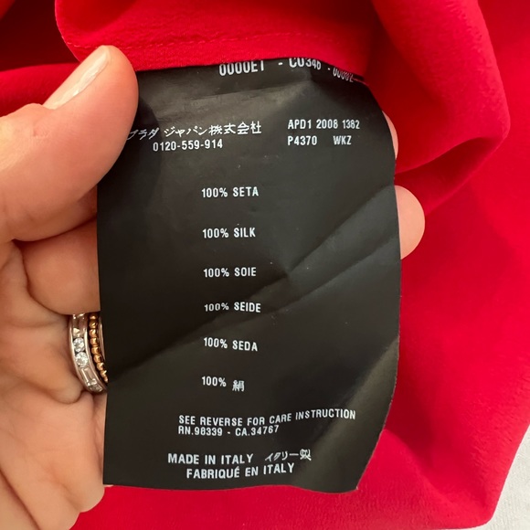 NWT red Prada asymmetrical button up top with sheer sleeves and bow - Picture 5 of 6